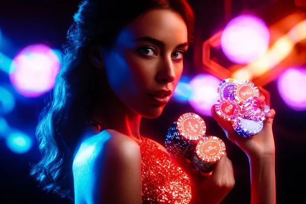 A glamorous woman holding casino chips in a neon-lit environment, representing the premium online casino atmosphere of L85.